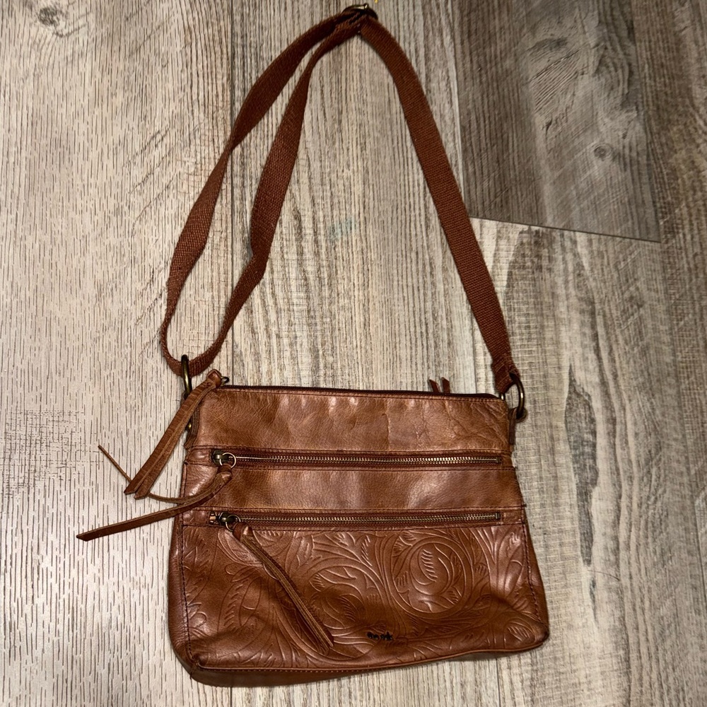 The SAK leather teak embossed brown crossbody multi pocket purse handbag